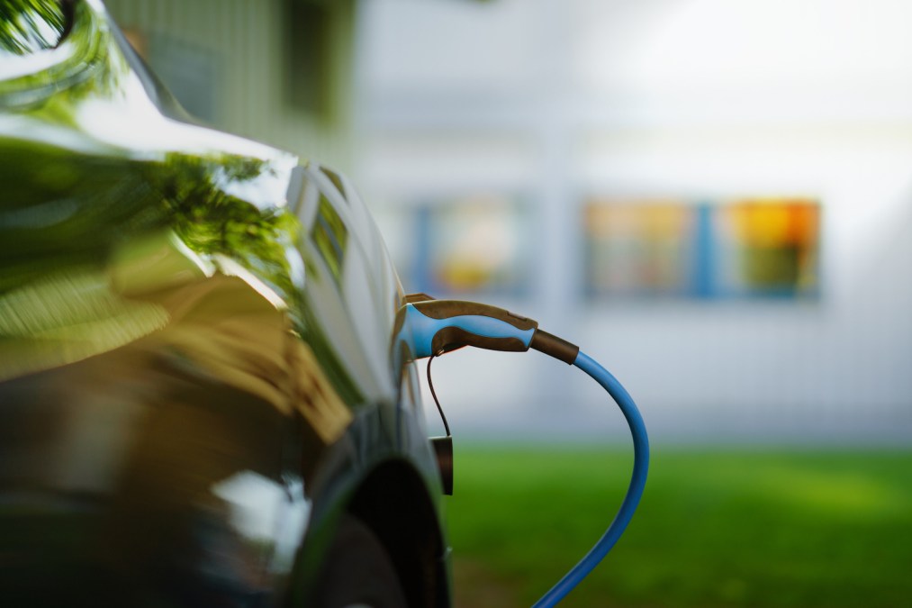 electric car charging at station