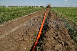 laying conduit in the ground