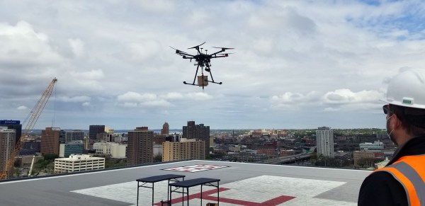 drone holding a package