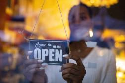 woman with open sign