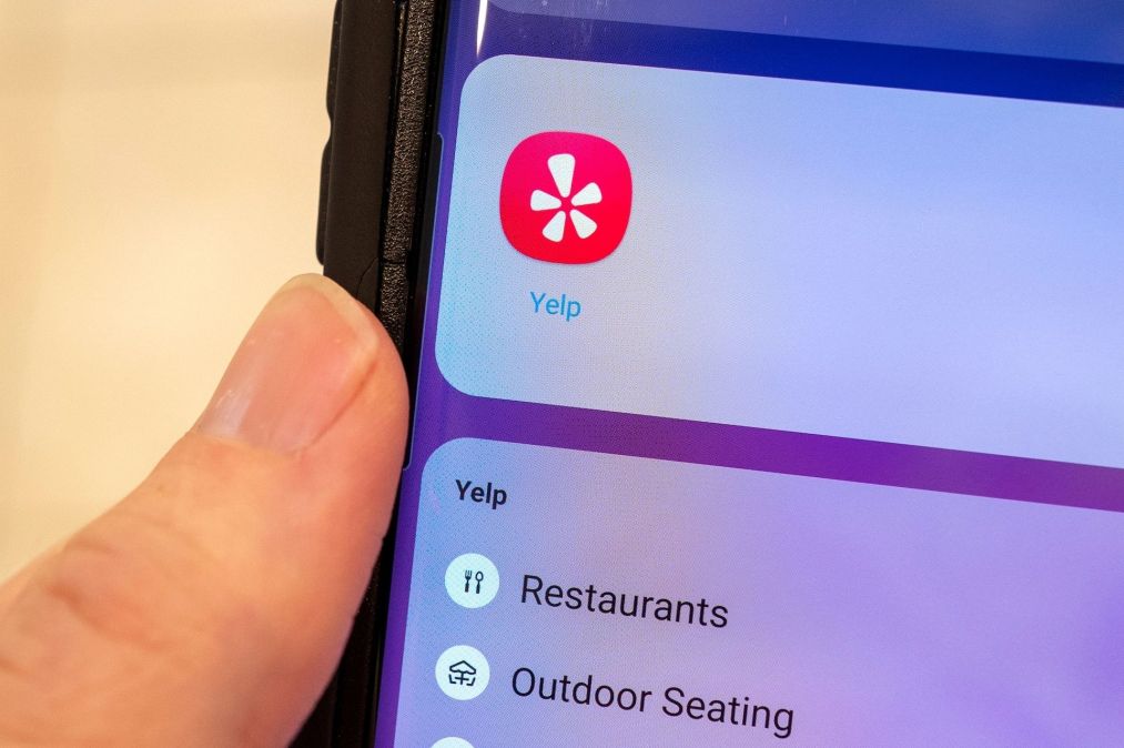 Yelp icon on smartphone screen