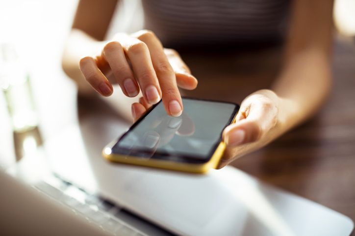 woman using smartphone