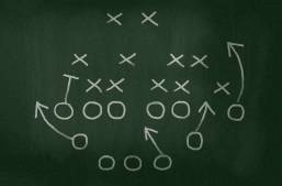 football play on chalkboard