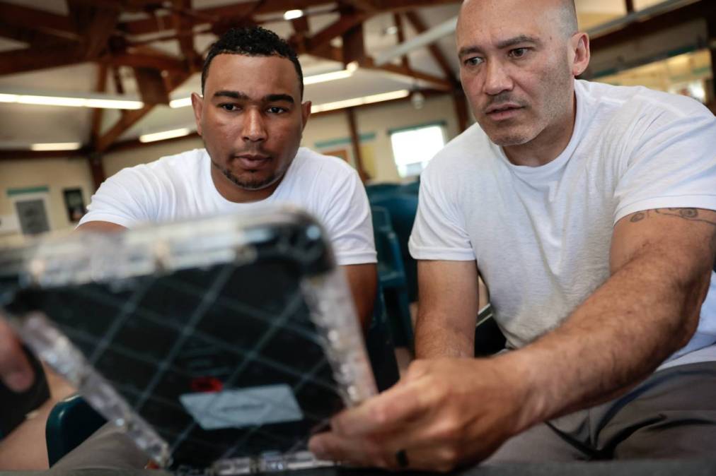 prison inmates using tablet