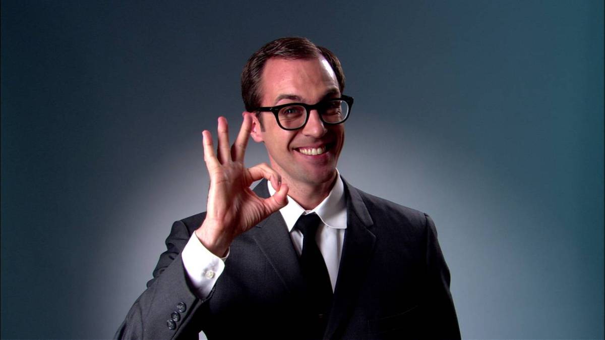 business guy giving OK sign